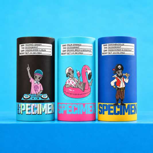 Specimen Cosmic Commander natural deodorant three-pack: Techno-Daddy, Palm Springs and Swashbuckler tubes on a blue ledge